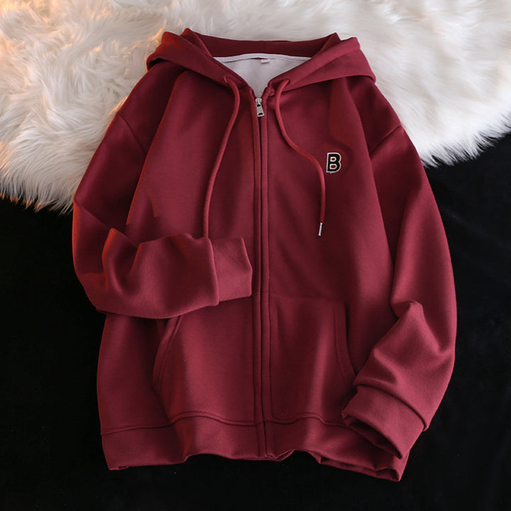 Femme Cozy Zip-Up Hoodie med elegant broderet detalje Stilla