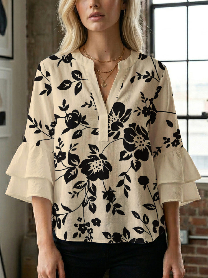 Dame afslappet bluse med flæseærmer og botanisk print Skovae