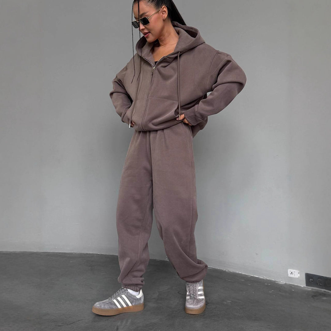 Kvindernes komfortable hættetrøje jumpsuit med høj kvalitets lynlås og afslappet pasform