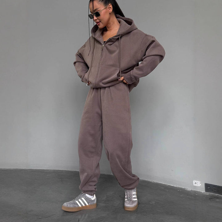 Kvindernes komfortable hættetrøje jumpsuit med høj kvalitets lynlås og afslappet pasform