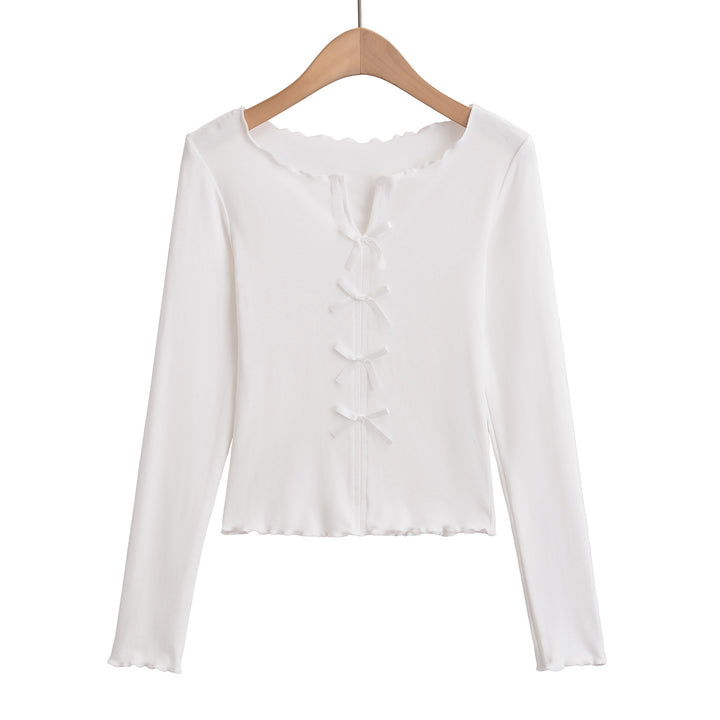 Dame elegant top med floral skæring og fine sløjfedetaljer Stilla