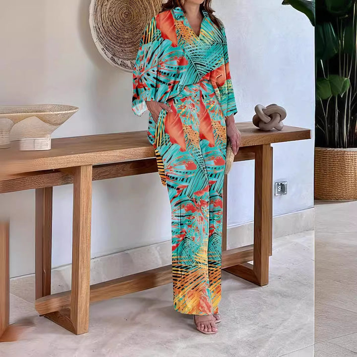 Dame Elegant og luftig strandkombination med florale mønstre Stilla