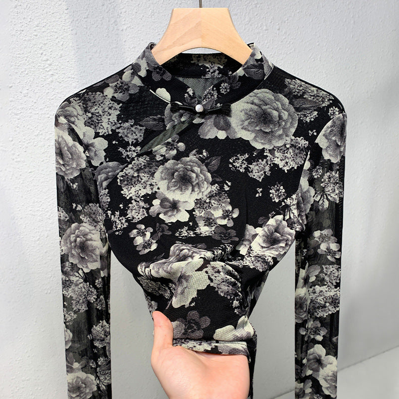 Dame elegant top med florale mønstre og raffinerede knapdetaljer Stilla