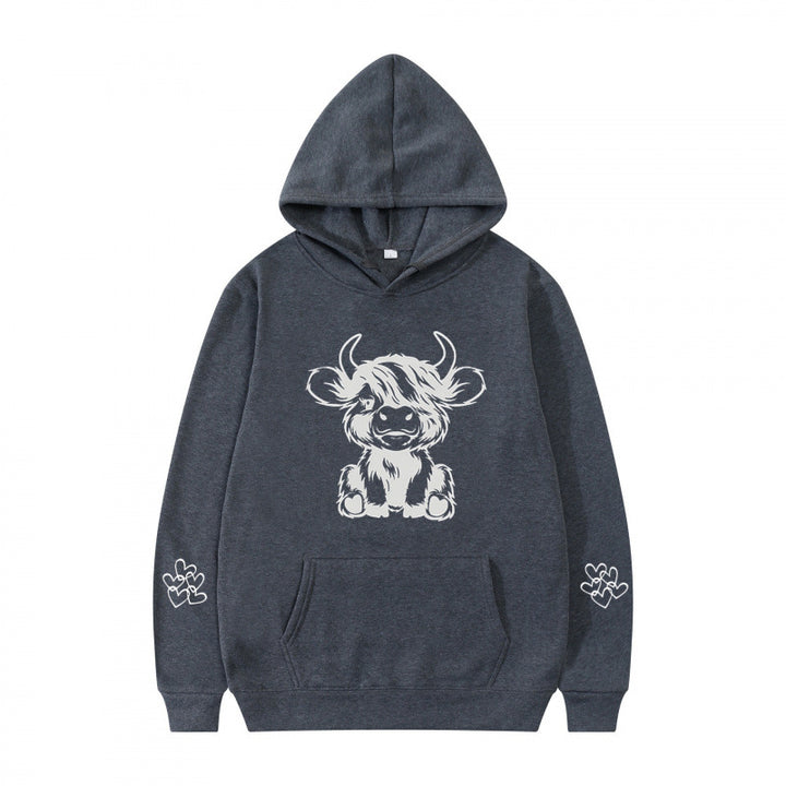 Kvindernes hætte sweatshirt med charmerende kvægmotiv og praktiske kængurulommer Skovae