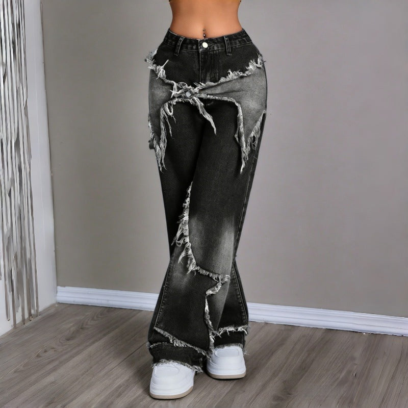 Damebredde jeans i moderne destroyed-look med frynset detaljer Skovae