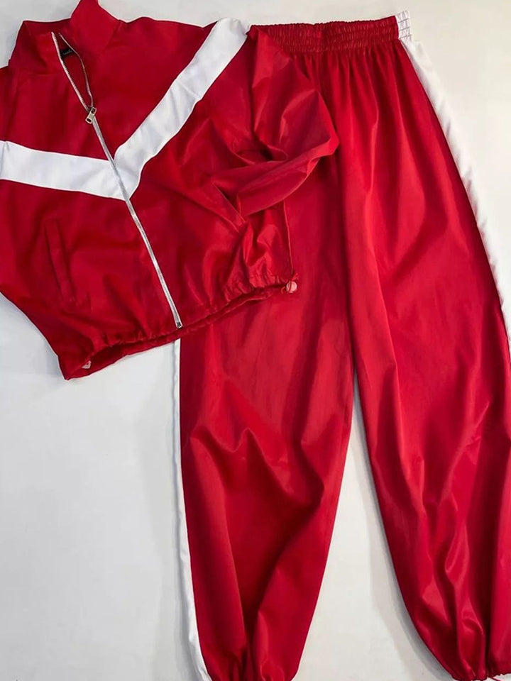 Kvinders sporty vindjakke med elastiske manchetter og reflekterende detaljer Skovae