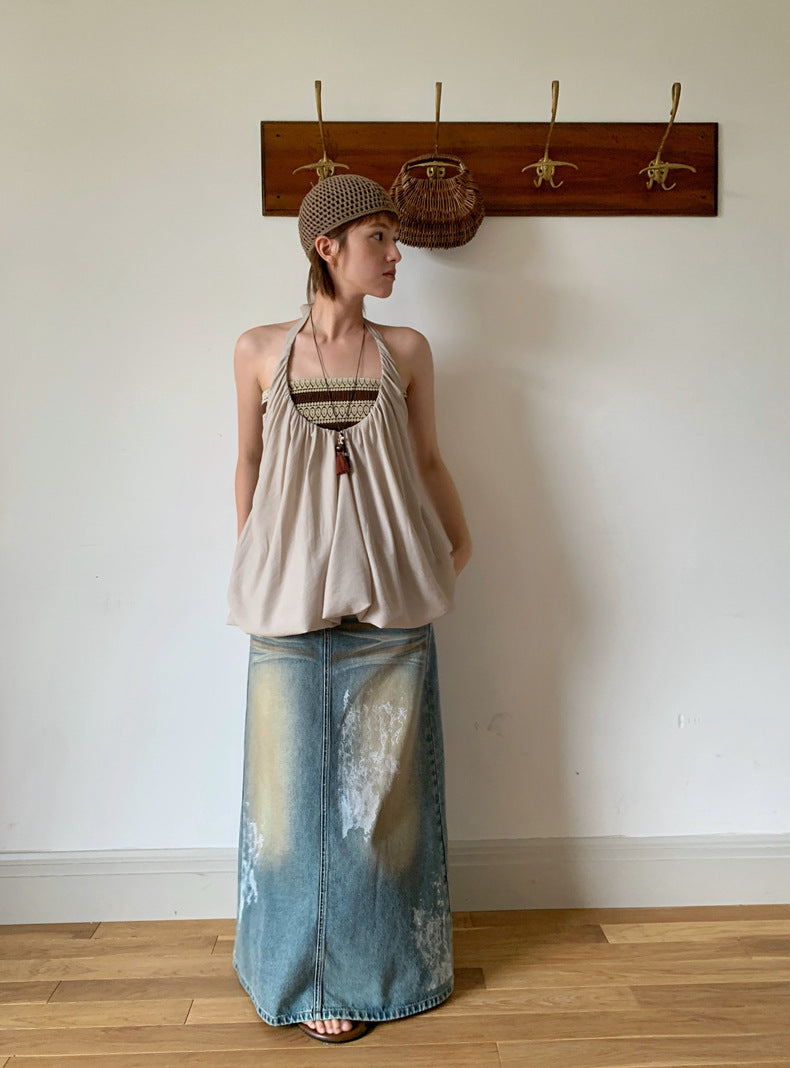 Dame luftig top med halterneck design og blødt draperet pasform Stilla