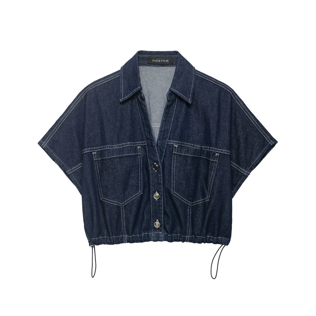 Dame Oversize Denim-Bluse med praktiske lommer og elastisk bund Skovae
