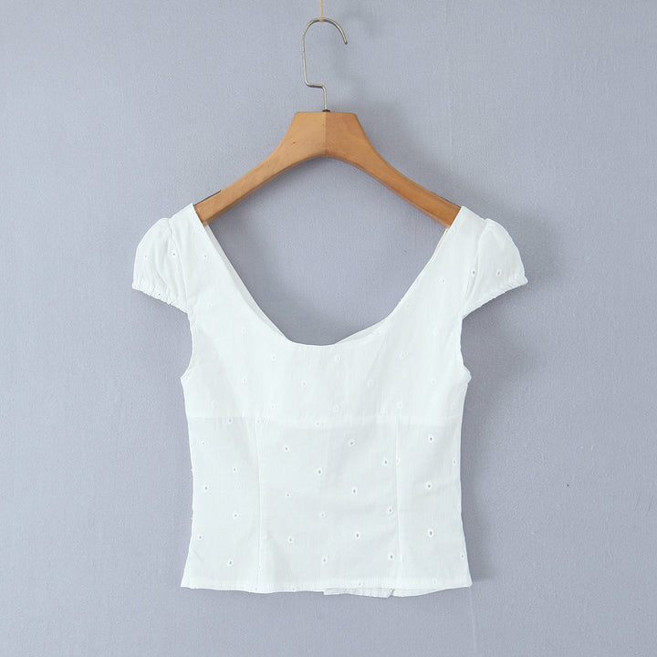 Dame legesygt crop-top med volangdetaljer og knaplukning Stilla