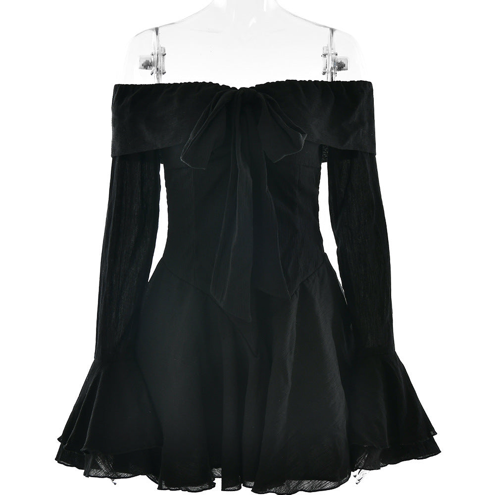 Dame off-shoulder minikjole med voluminøse flæsedetaljer og elegant taljebælte Stilla