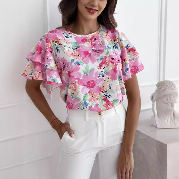 Damebluse med volumenfulde flæseærmer og blomsterprint Stilla