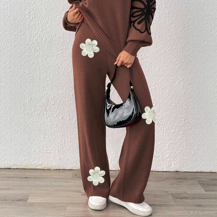 Dame strikbukser med blomstret design og bredt ben Stilla