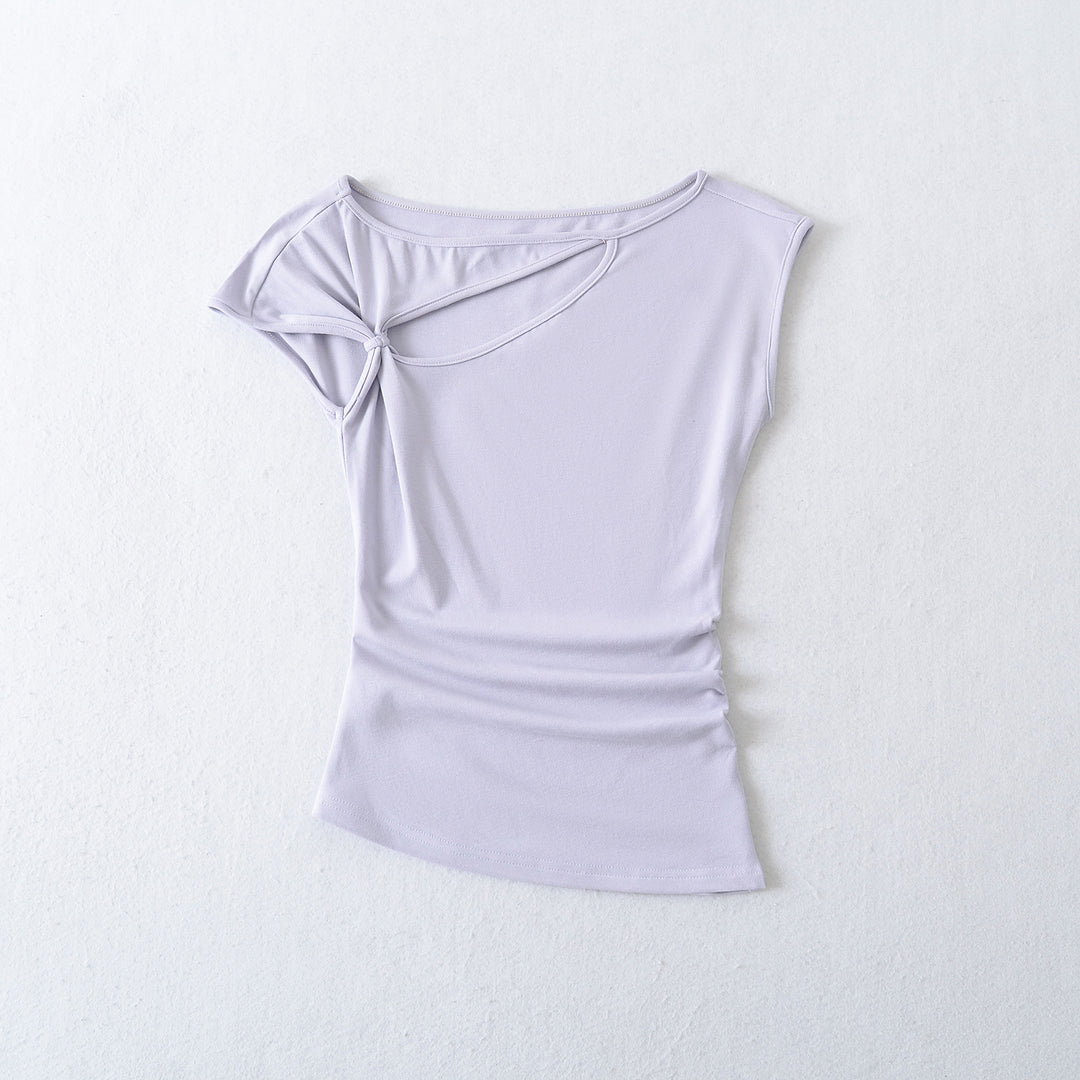 Dame figurtilpasset overdel med elegant drapering og raffineret skulderparti Stilla