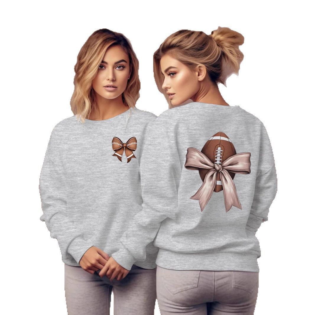 Dame sweatshirt med sødt fodboldmotiv og sløjfeaccent Stilla