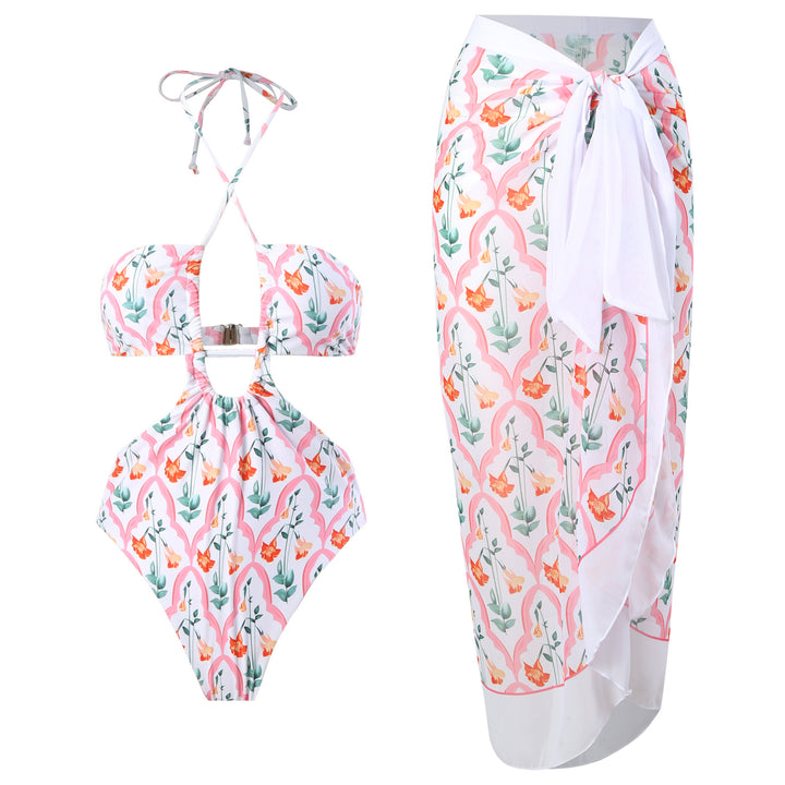 Dame badedragt med moderne snit og matchende sarong Stilla
