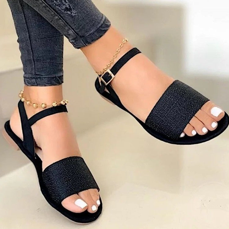 Dame remsandaler med glitrende overmateriale og justerbar ankelrem Stilla