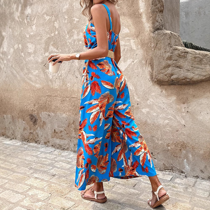 Dame maxijumpsuit med florale accenter og elastisk bånd Stilla