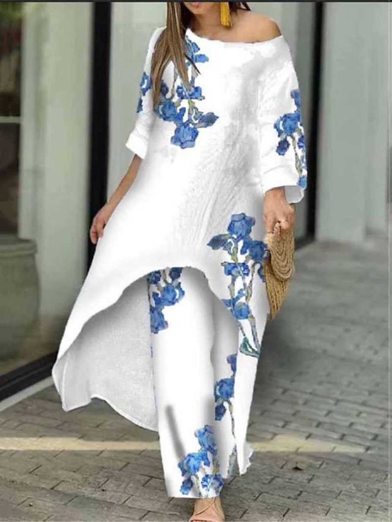 Dame maxikjole med blomsterdesign og asymmetrisk kant Stilla