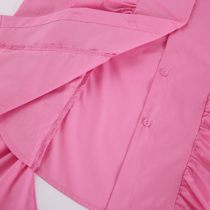 Damebluse med voluminøse rufflesdetaljer og elegante pufærmer Stilla