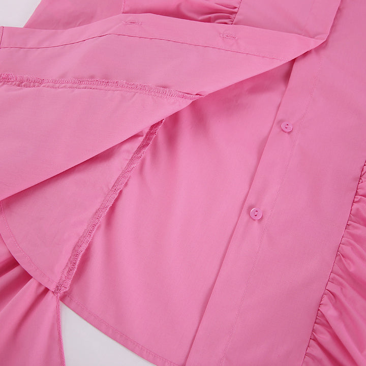 Damebluse med voluminøse rufflesdetaljer og elegante pufærmer Stilla
