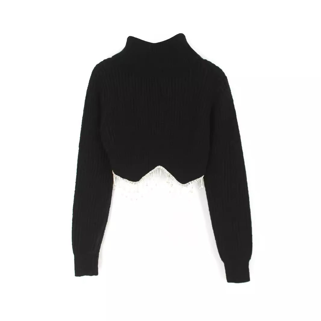 Dame moderigtig rullekravesweater med glitrende dekorationer Stilla