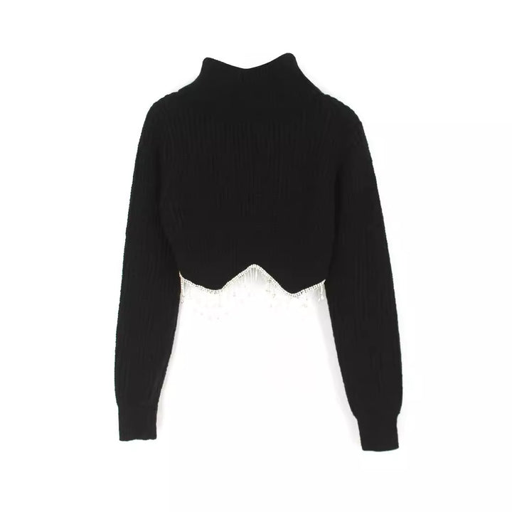 Dame moderigtig rullekravesweater med glitrende dekorationer Stilla