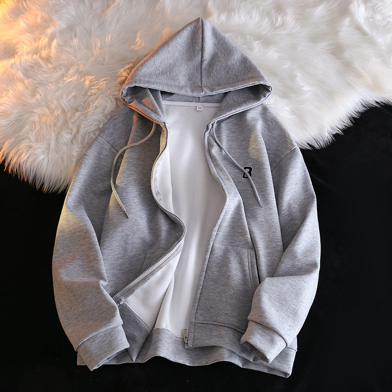 Femme Cozy Zip-Up Hoodie med elegant broderet detalje Stilla