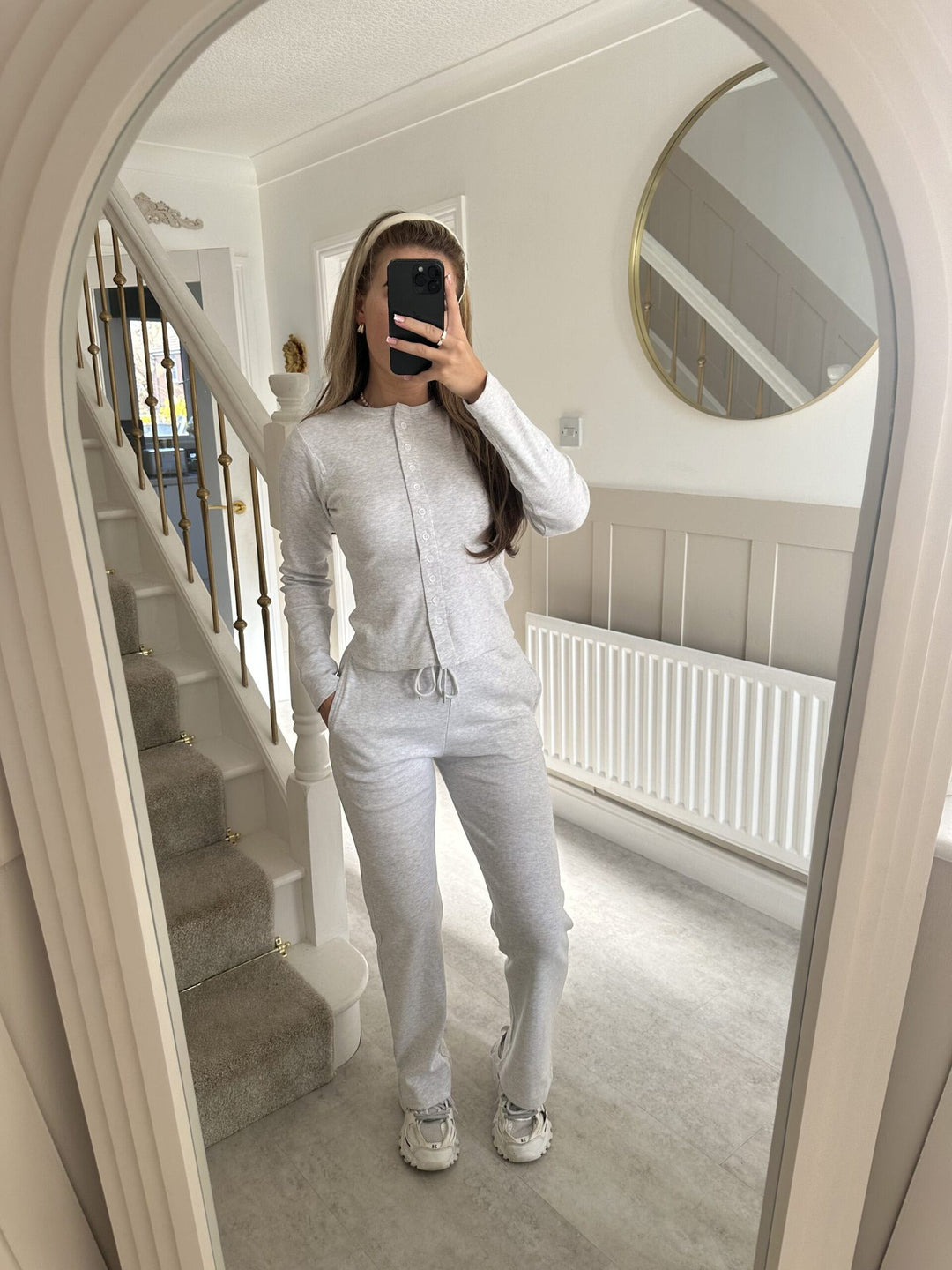 Kvindernes hyggelige strik jumpsuit med knapdetaljer og elegant design Skovae