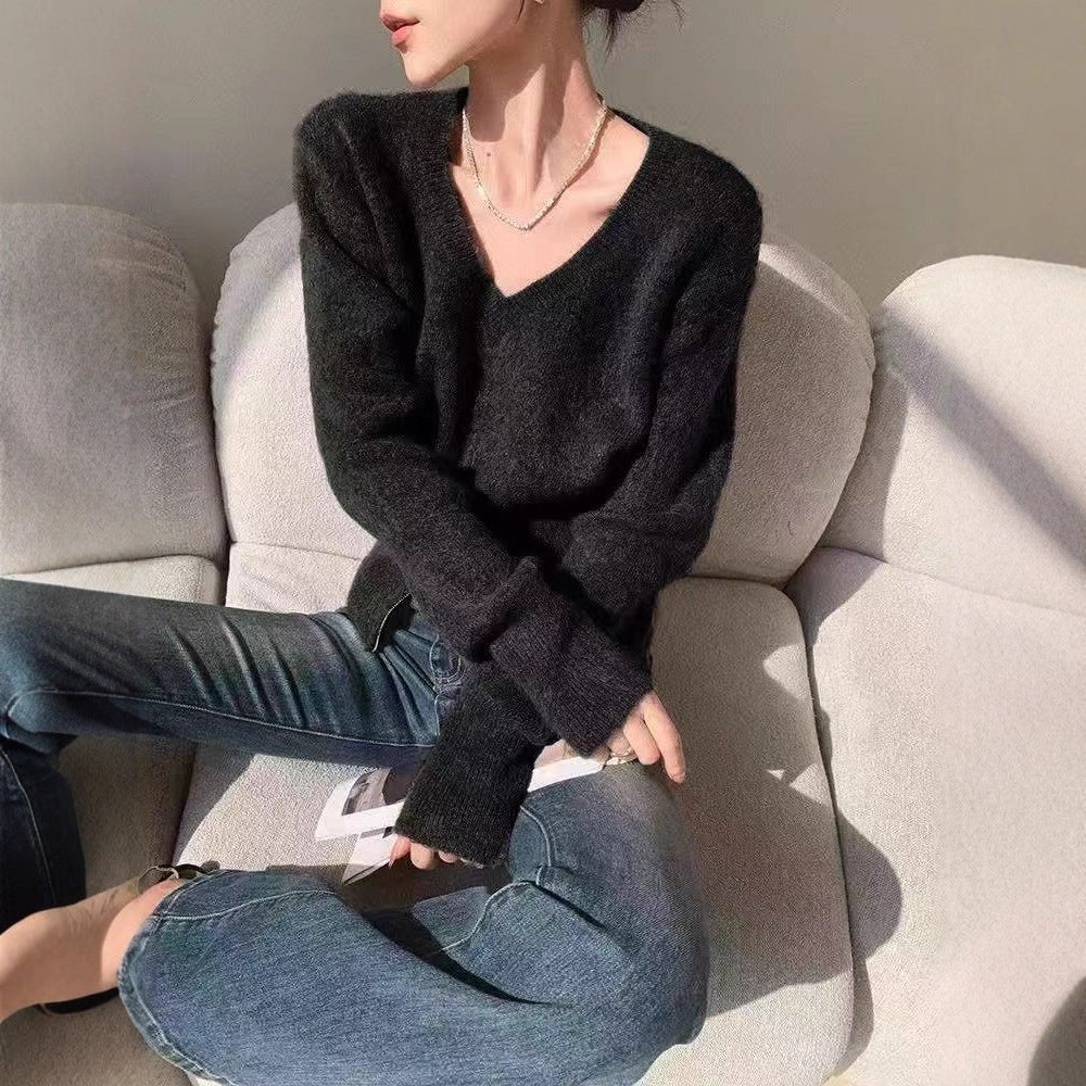 Damer fashionable cardigan med dyb V-hals og lynlås Stilla
