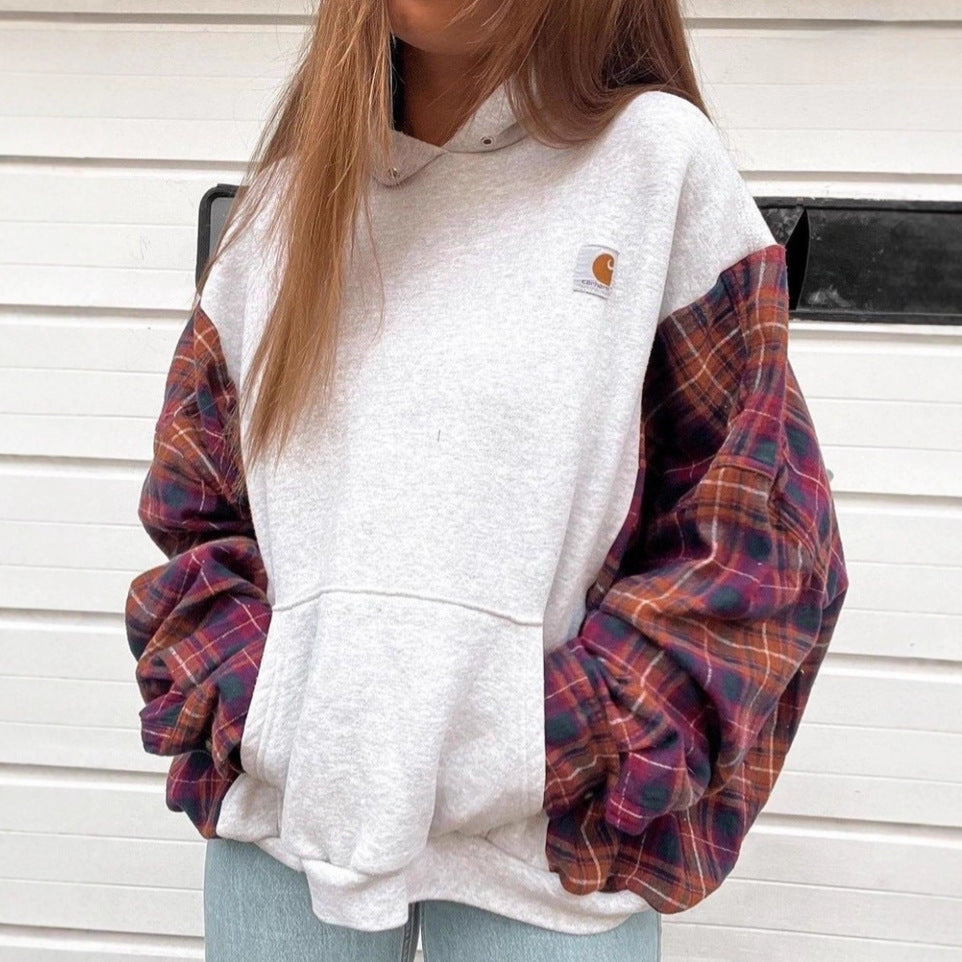 Damer nan oversized hættetrøje med ternede flannelærmer og kængurulomme Skovae