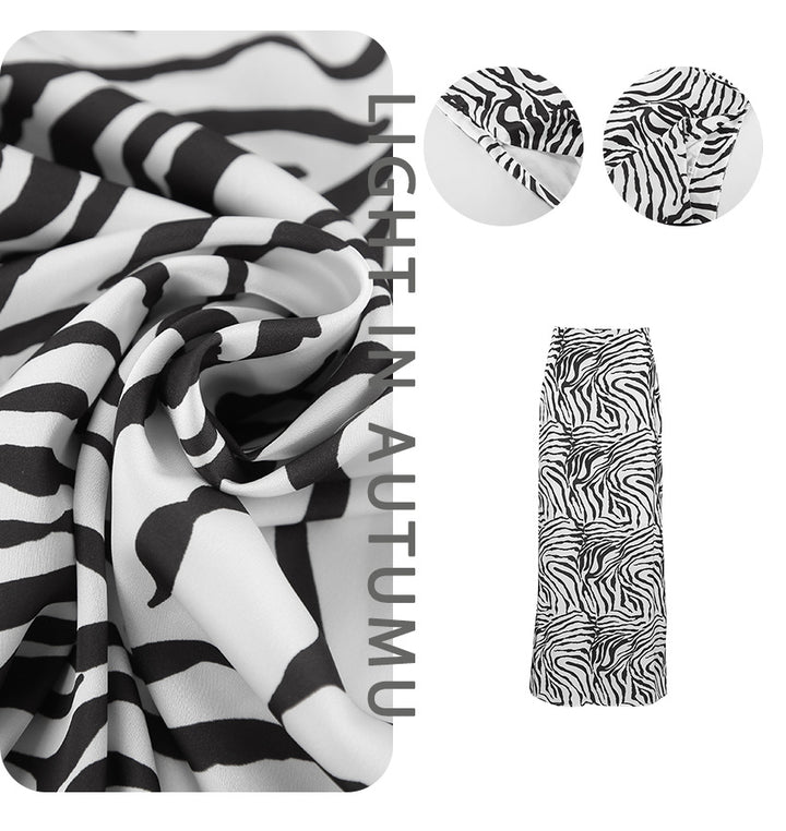 Dame Maxiskørt i trendy zebraprint med flydende stof og højt skåret talje Stilla