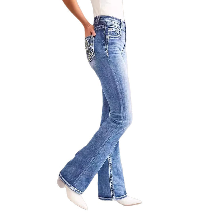 Dame udvidede jeans i vintage stil med kvalitetsdetaljer og raffineret broderi Skovae