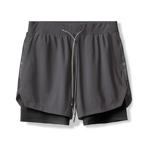 Damer Sportslige Dobbelt-shorts med integreret kompressionsunderbukser og elastisk talje Stilla