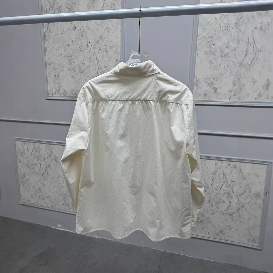 Damebluse med farverige dyremotiver og praktiske lommer Stilla