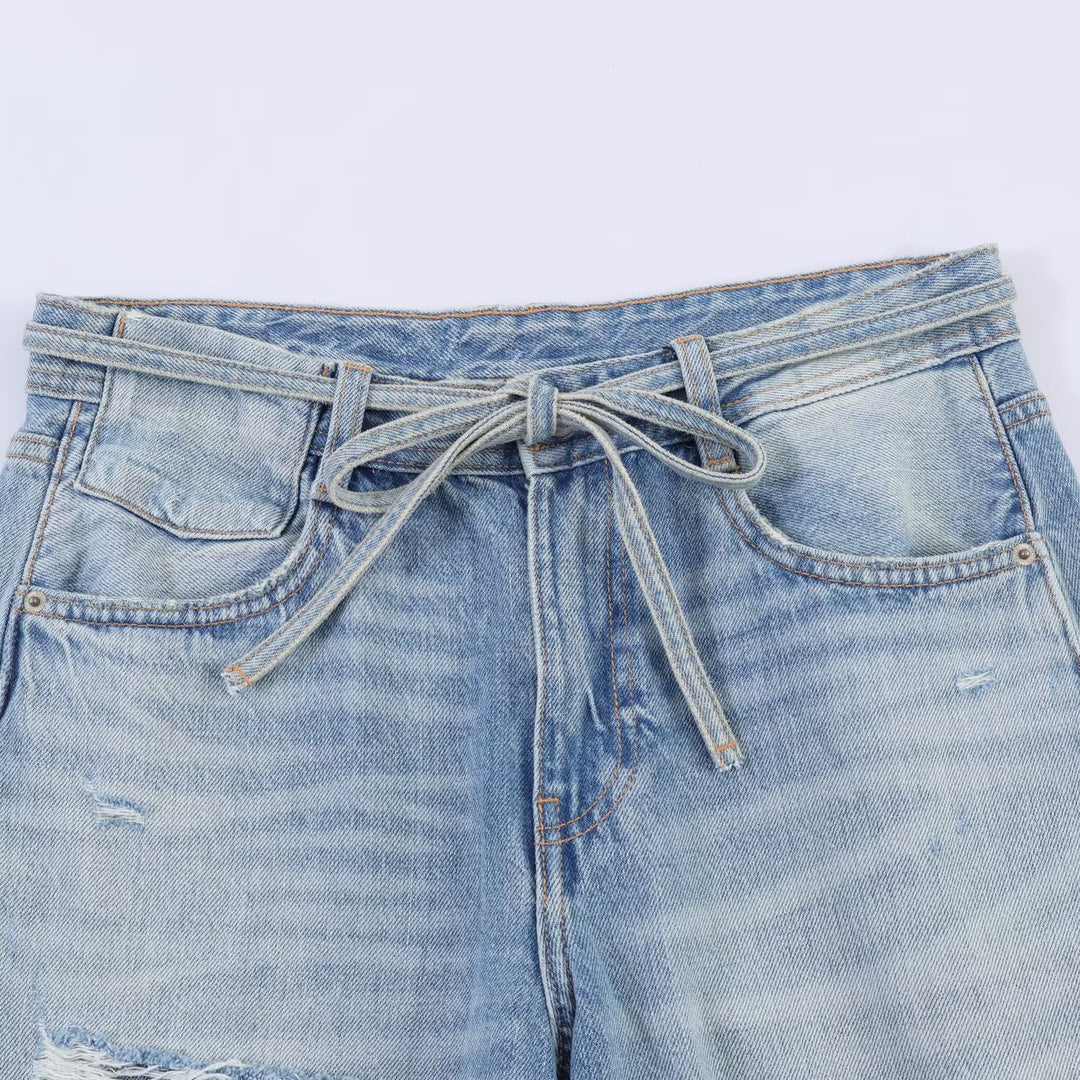 Dame bred jeans i destroyed-look med justerbar talje Skovae