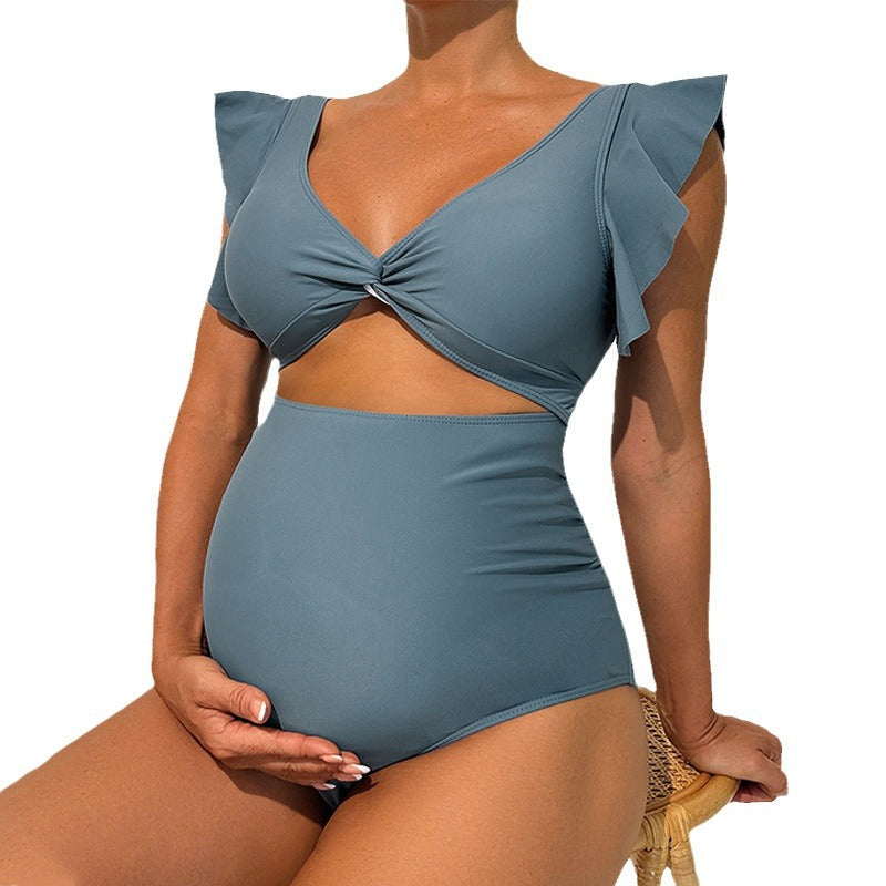 Dame one-piece swimsuit with romantic ruffle details Skovae