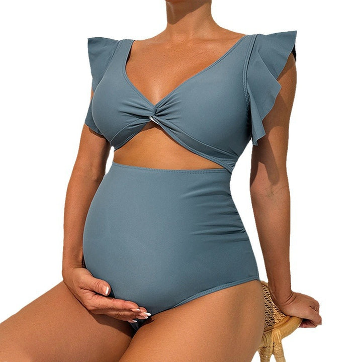 Dame one-piece swimsuit with romantic ruffle details Skovae