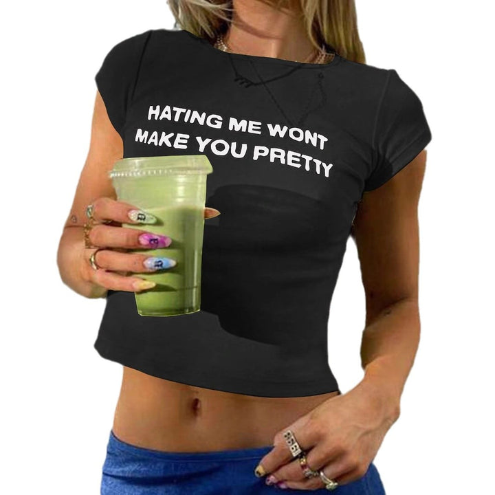 Dame Figursyet Crop-T-shirt med statement tekst Skovae