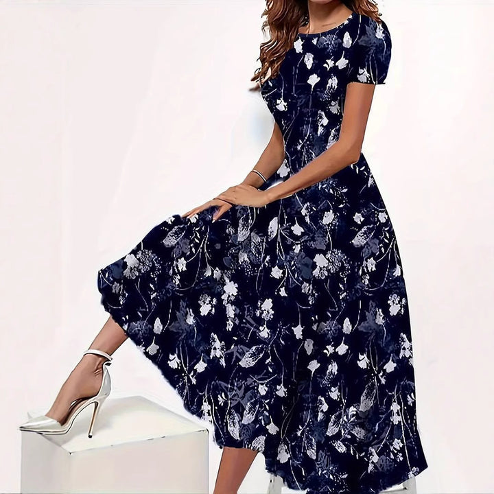 Dame maxikjole med floral tryk og elegant snit Stilla
