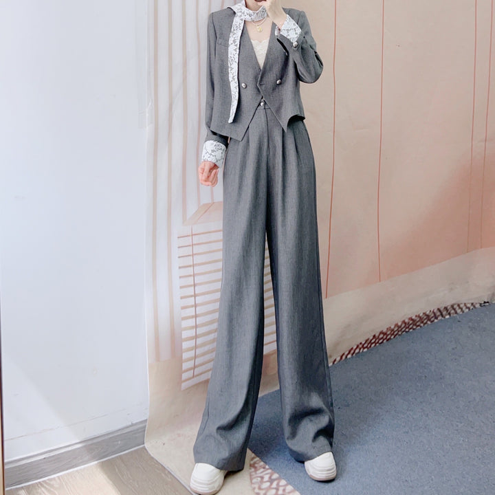 Dame elegant to-delt dragt med raffineret vest og vide bukser Stilla