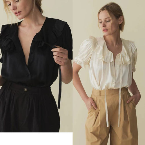Damebluse med voluminøse ruffle detaljer og dekorative spændingselementer Stilla