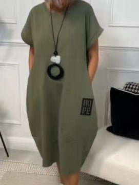 Dame afslappet Sweatdress med praktiske lommer og moderne skrift Stilla