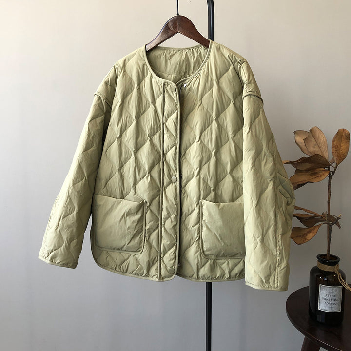 Dame kort skåret quiltet jakke med praktiske lommer og minimalistiske detaljer Stilla