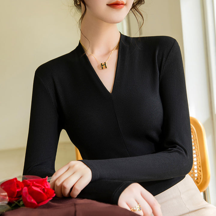 Dame Langærmet shirt med elegant V-hals og fin ribstruktur Stilla