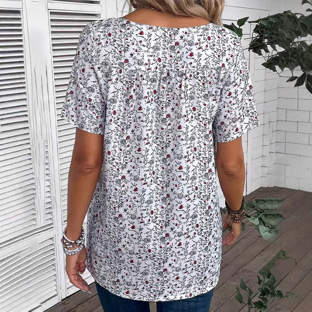 Dame nan afslappet kortærmet tunika-shirt med rund halsudskæring, delikat blomsterprint og dekorative brystfolder Skovae
