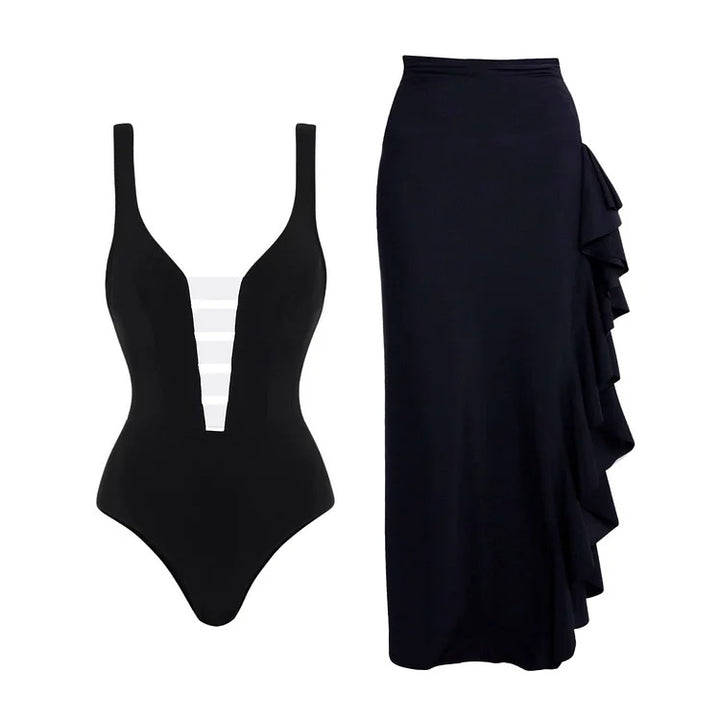 Dame badedragt med moderne off-shoulder design og elegant ruffles maxiskirt Skovae