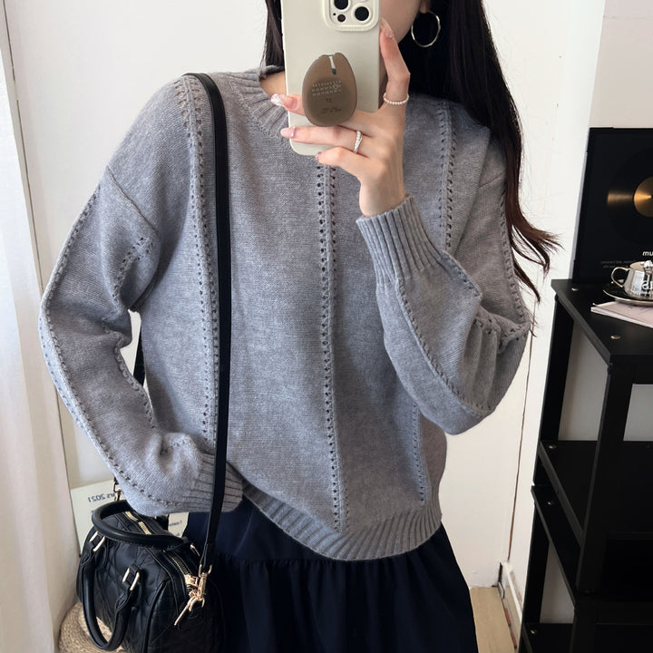Kvinders chunky strikket sweater med en feminin silhuet og tekstureret design Stilla