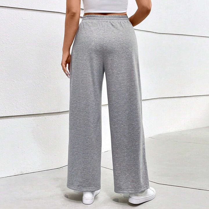 Dame løs siddende fritidshose med elastisk talje og crossover-design Skovae