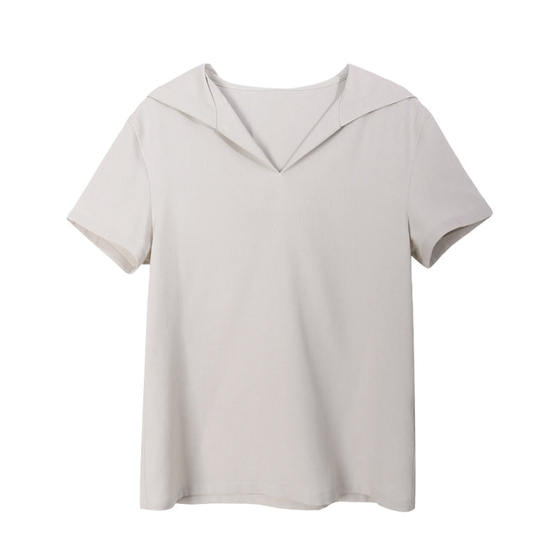 Dame afslappet sæt med minimalistisk bluse og nederdel Stilla