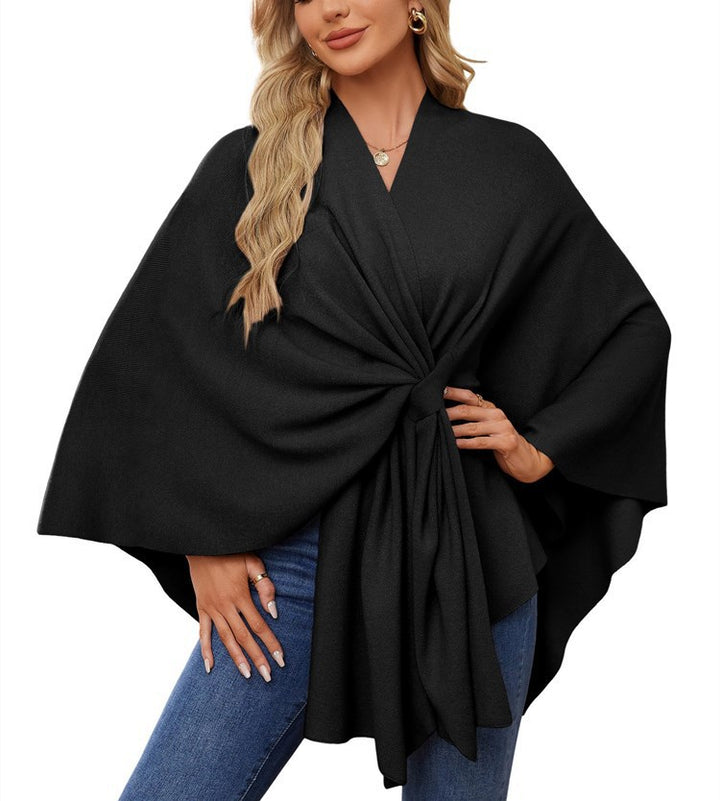 Dame elegant strikkeponcho med raffinerede draperinger og taljebælte Stilla